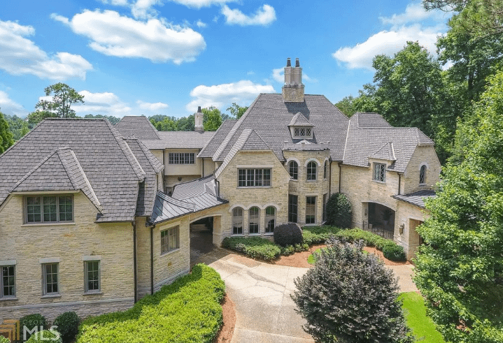 Lakefront Limestone Home In Suwanee, Georgia - Homes of the Rich