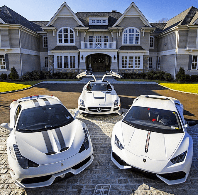 rich house with cars